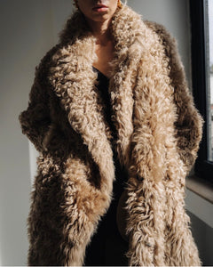 Reversible curly shearling coat