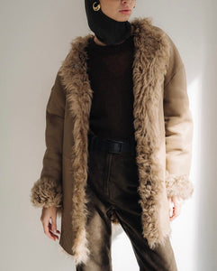 Reversible curly shearling coat